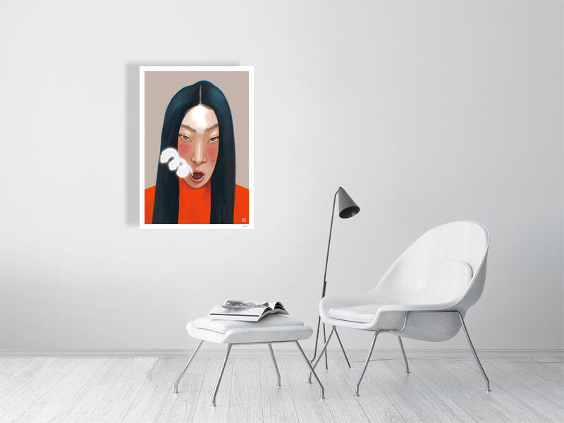 Framed artwork of a woman with dark hair and red top in a modern living room.