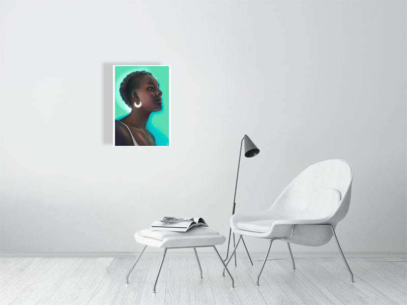 Modern interior with a white chair, ottoman, and lamp, featuring a framed artwork of a woman on the wall.